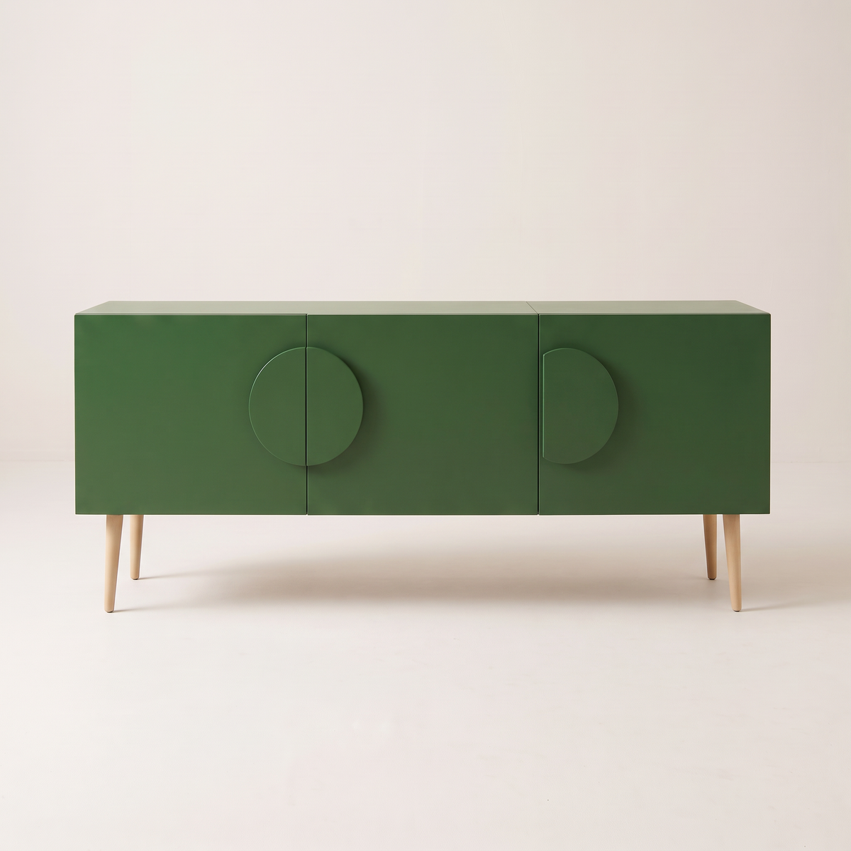 Alto Green storage cabinet in matte green with half-disc handles and tapered splayed legs, front view