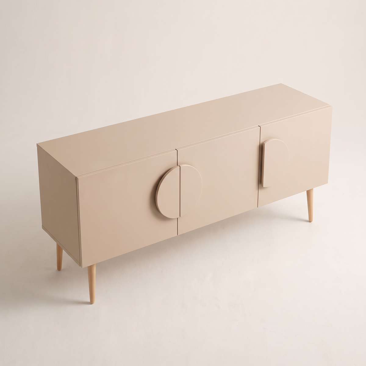 Alto Ivory storage cabinet in matte ivory-beige with half-disc handles, elevated three-quarter view showing the top