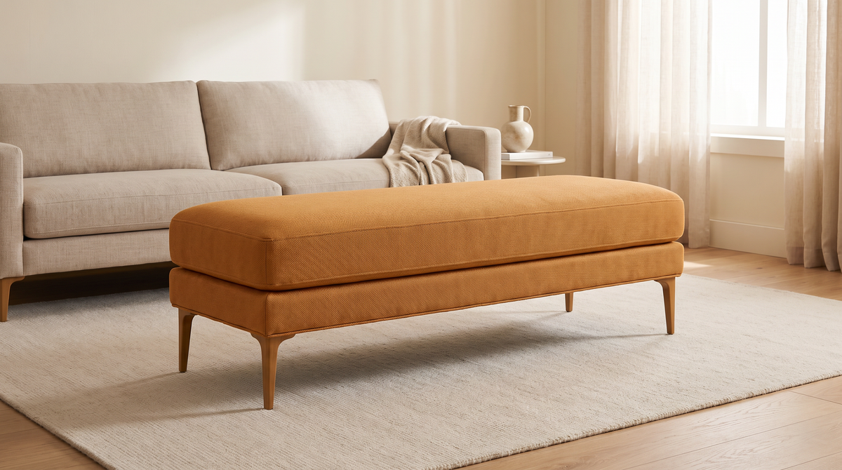 Amber Muse ottoman bench styled in a calm living room on a pale rug