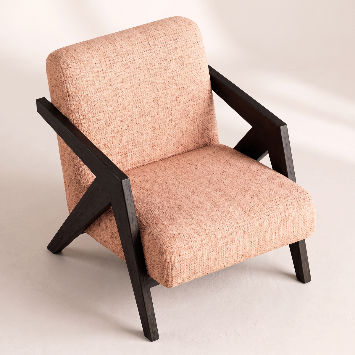 Axis Sand lounge chair in sand peach tweed with black wooden frame, elevated view from above