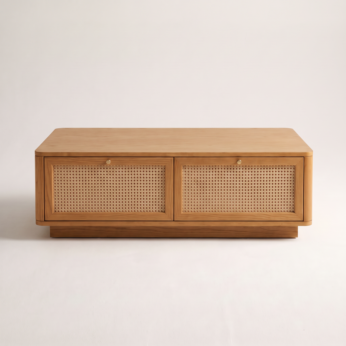 Bento Ash coffee table in honey ash with two cane drawer fronts, straight front elevation