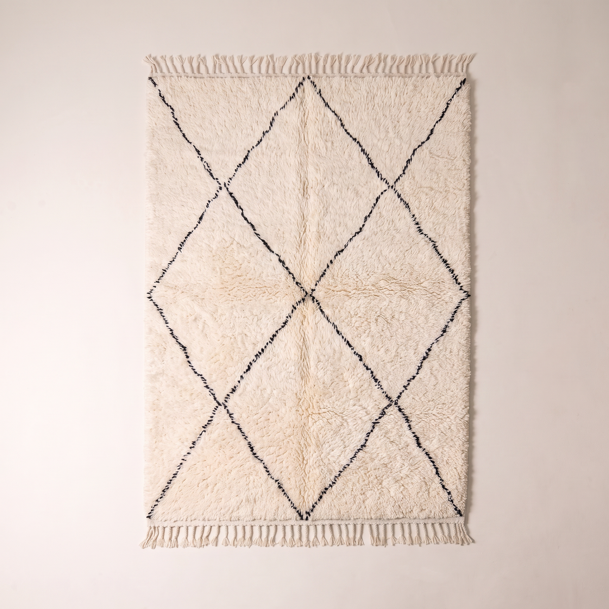 Berber Cloud Shag overhead flat lay showing the charcoal diamond lattice on ivory wool