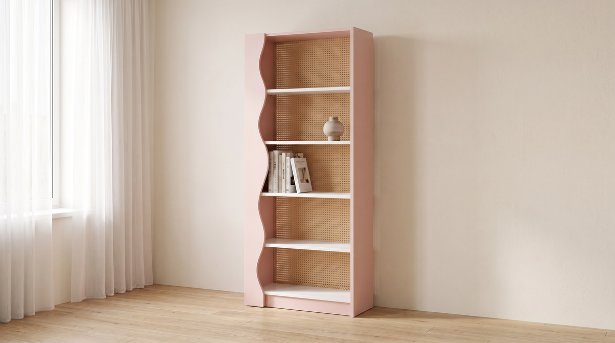 Blush Cane bookcase styled in a calm living room