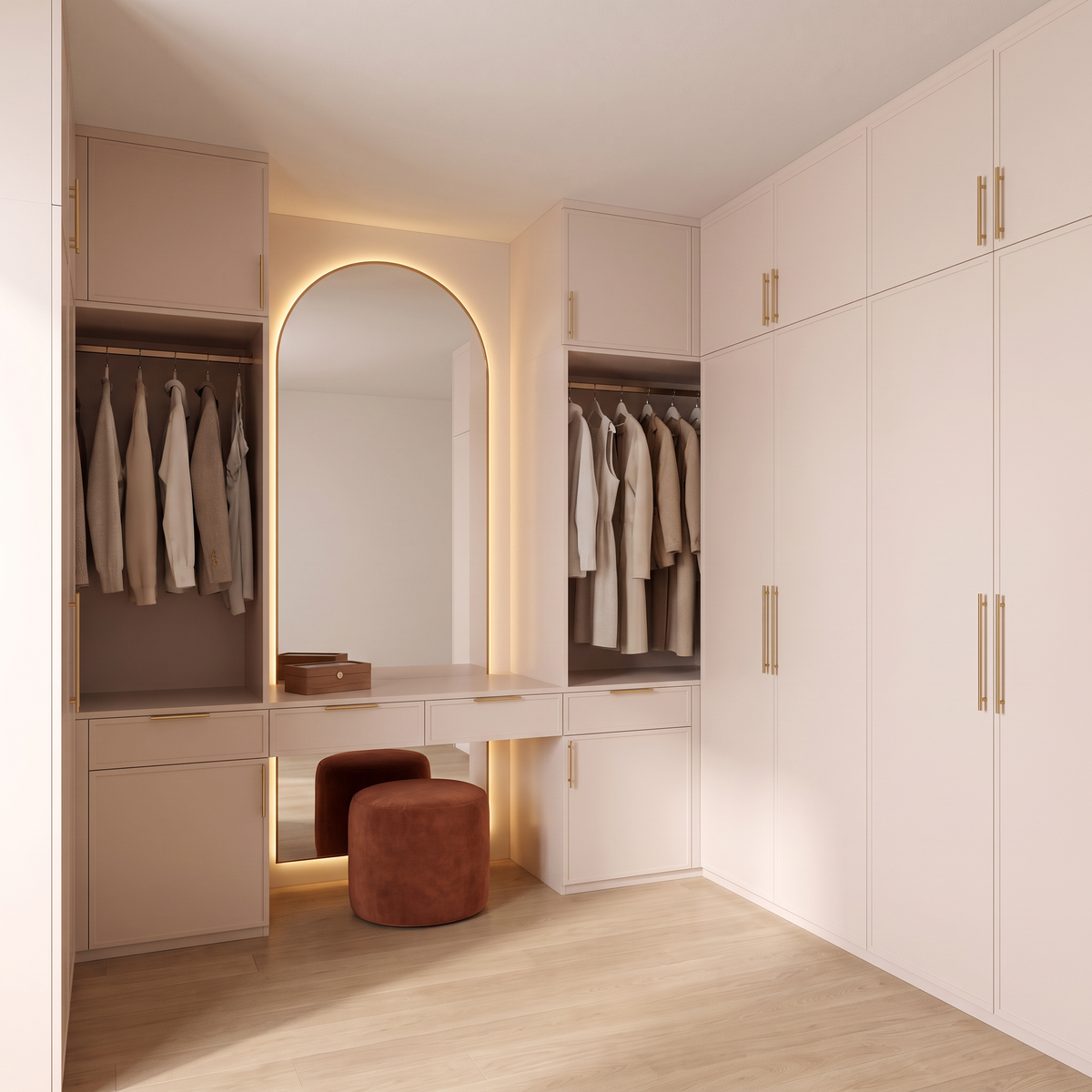 Boudoir Closet design proposal: walk-in closet in blush-ivory lacquer with brass handles, an LED-lit arched mirror dressing nook and a rust velvet pouf, front three-quarter view