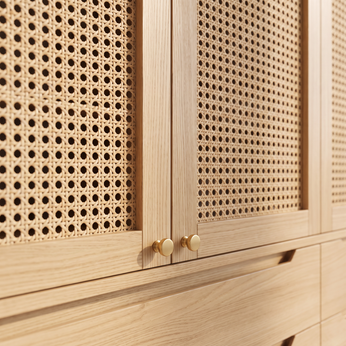 Cane Loft Closet detail: woven cane door panels in ash frames with small brass knobs above a carved finger-pull drawer