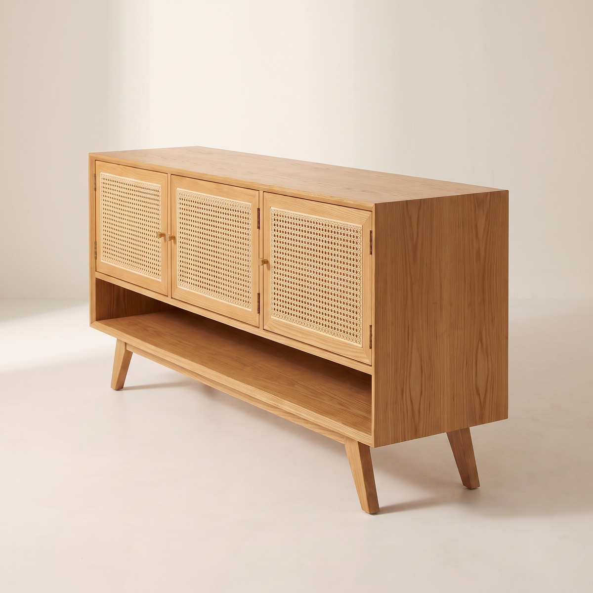 Cane Tempo honey ash TV unit with cane doors, front-right three-quarter view