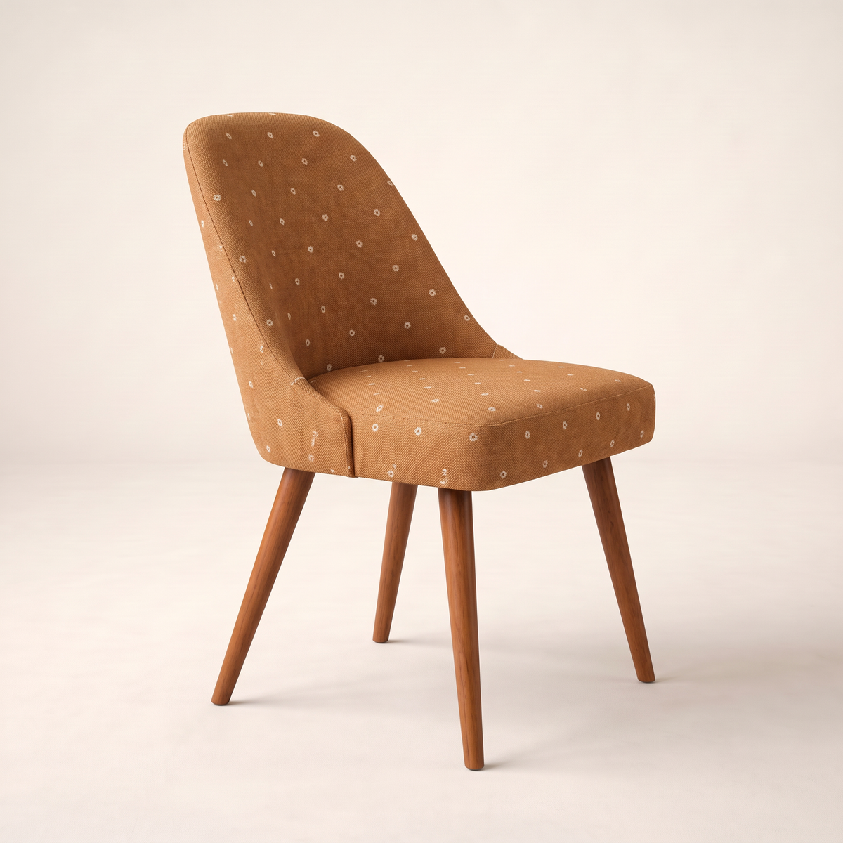 Chair 402 dining chair in caramel dotted upholstery with tapered wooden legs, front-right three-quarter view