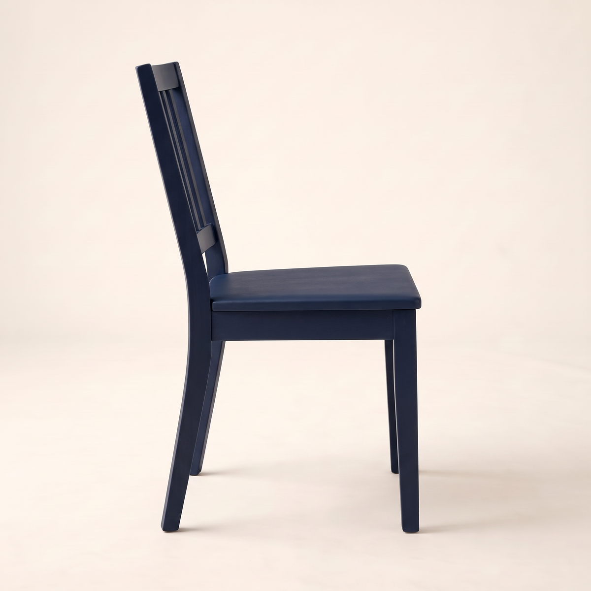 Chair 505 dining chair in navy blue with slatted back and flat seat, side profile