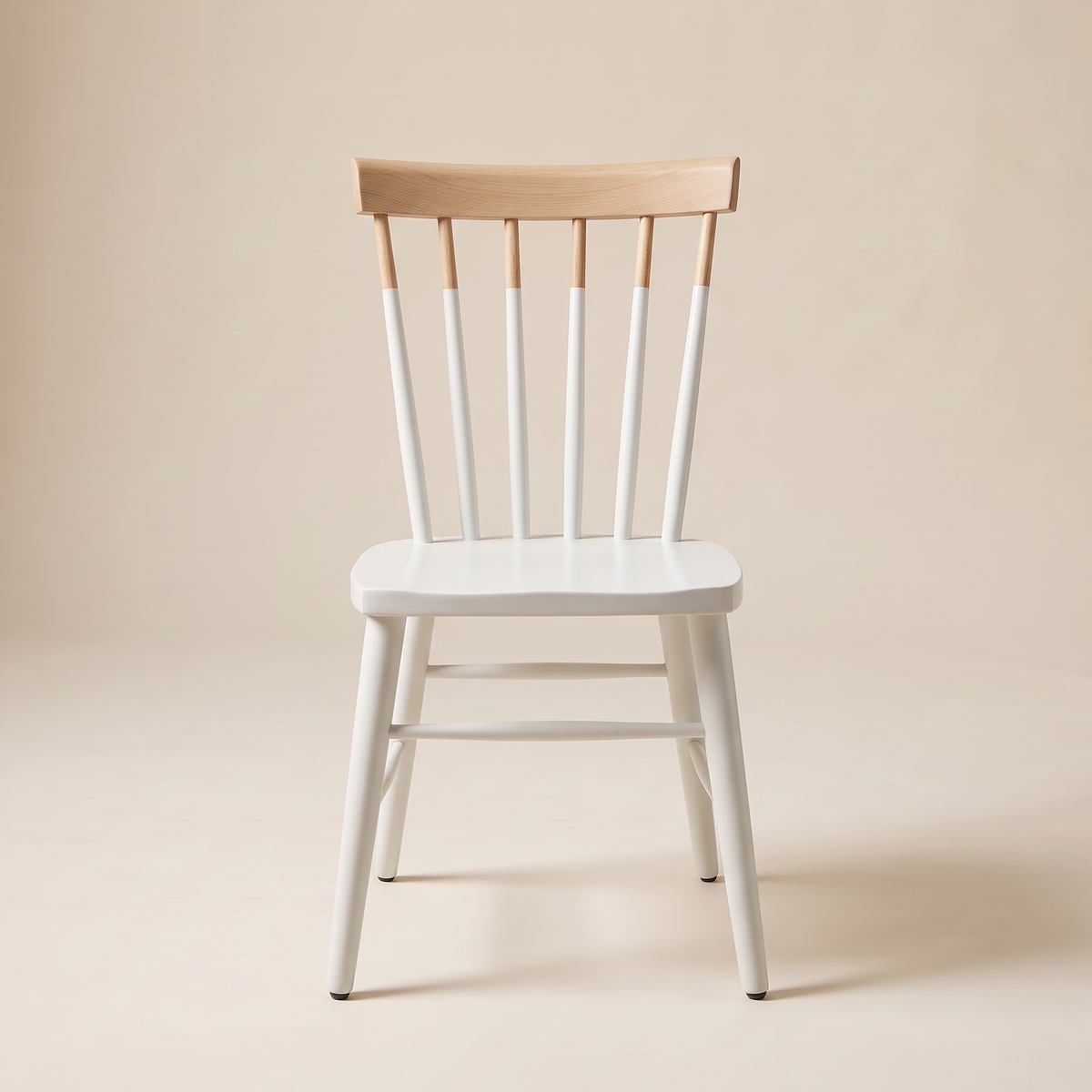 Chair 507 white spindle-back dining chair with natural wood crest rail, front view