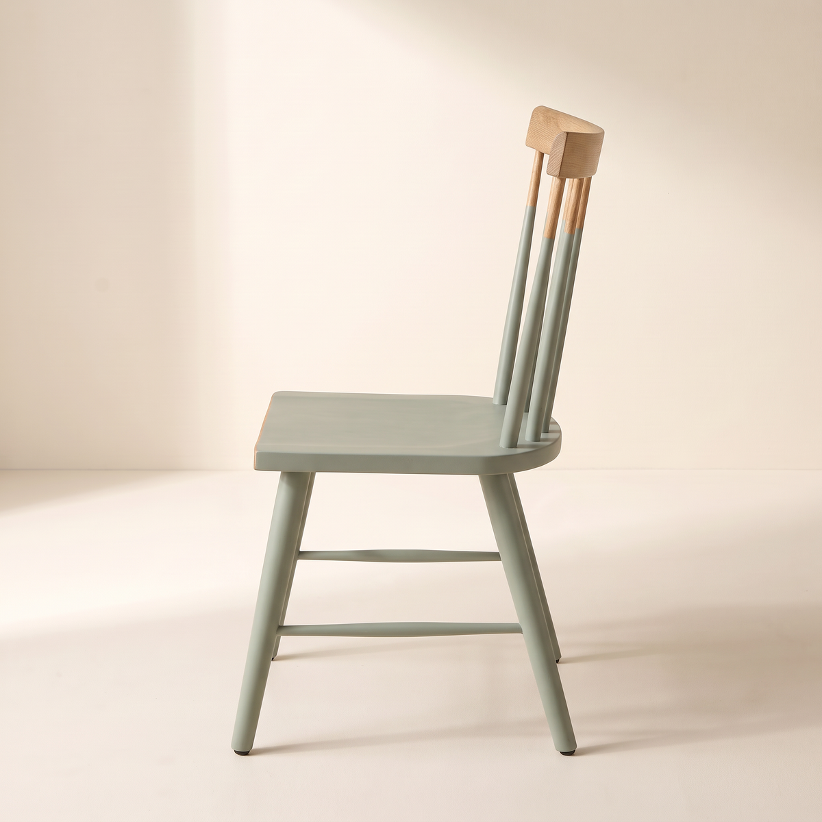 Chair 508 sage green spindle-back dining chair with natural wood crest rail, side profile