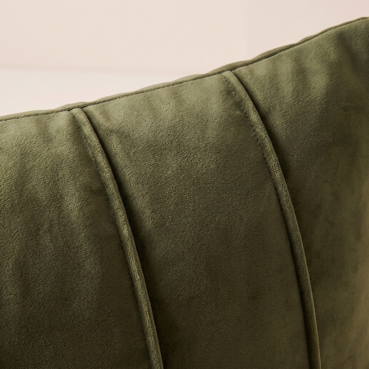 Close-up of Channel Velvet Cushion showing stitched channels and olive velvet nap