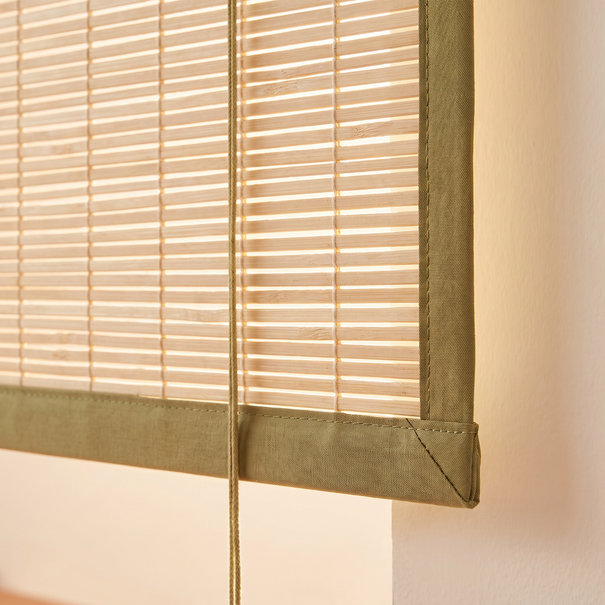 Close-up of Chik Bamboo Blind corner showing split bamboo, cotton thread weave and olive tape binding