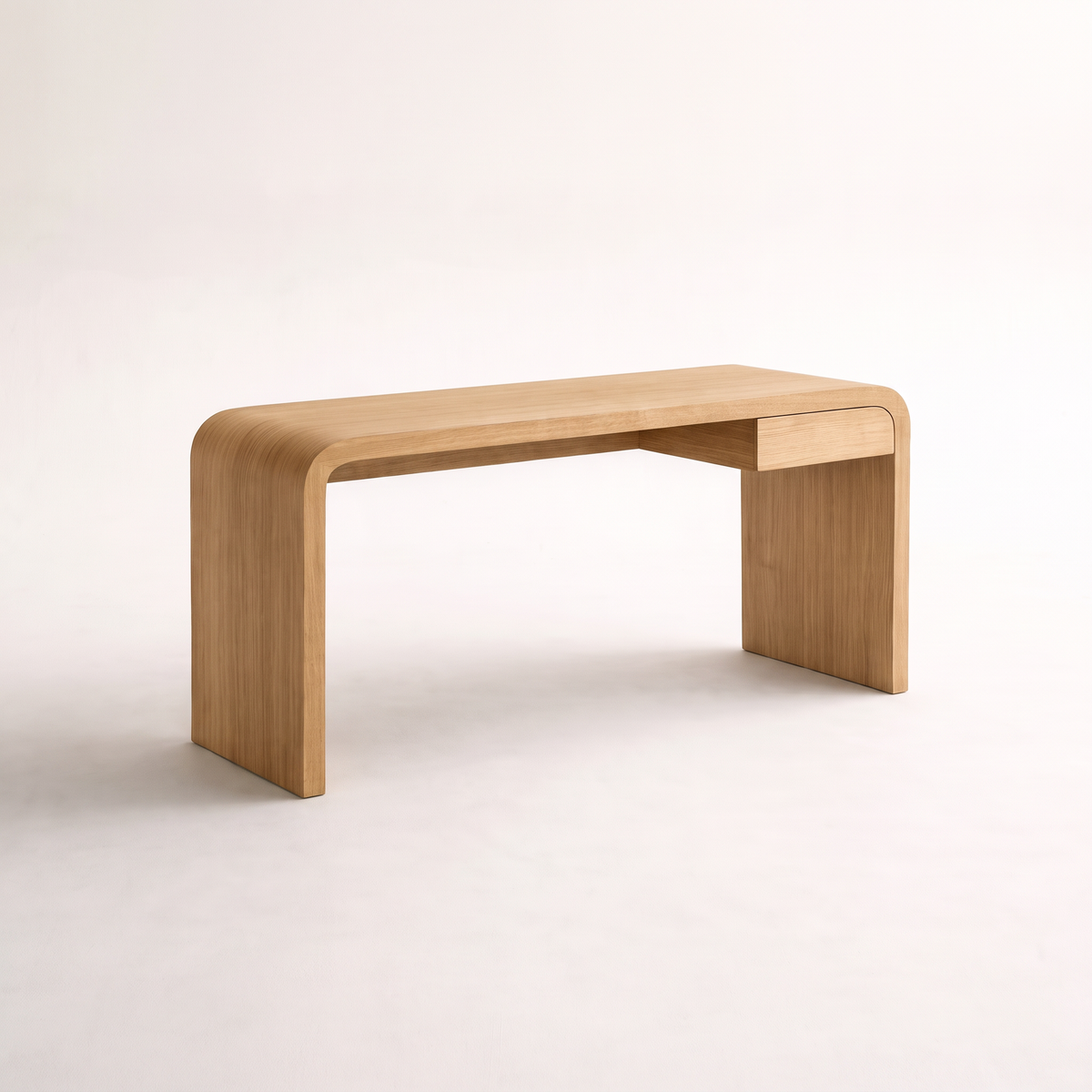 Core Desk waterfall study desk in light natural wood finish, front three-quarter view