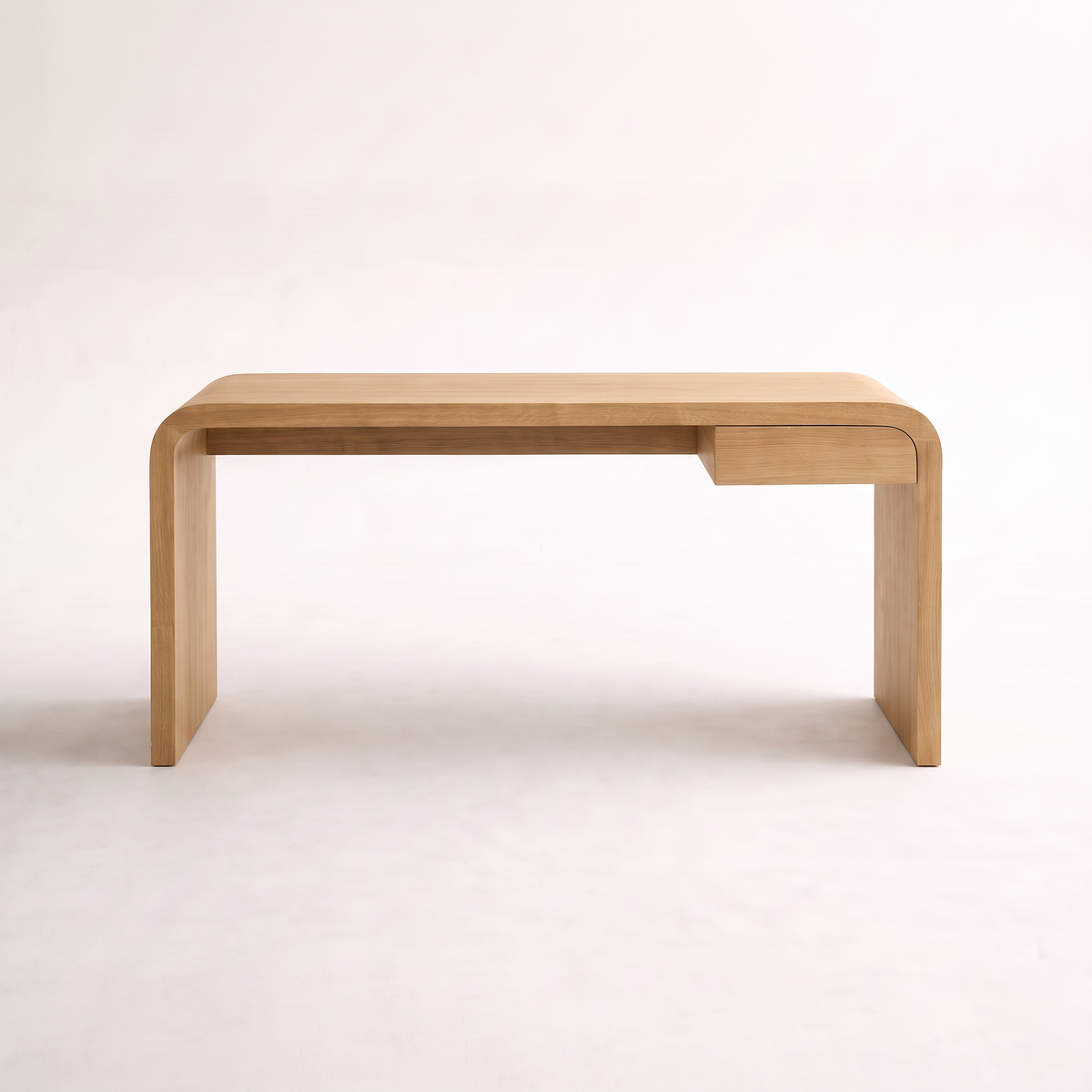 Core Desk waterfall study desk in light natural wood finish with slim drawer, front view