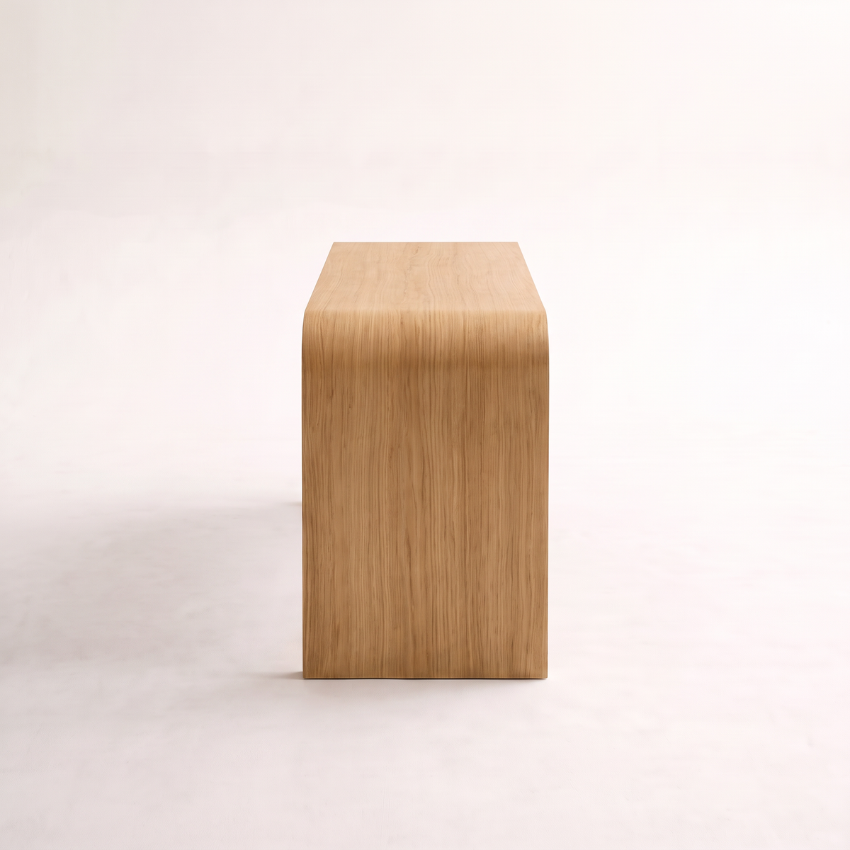 Core Desk waterfall study desk in light natural wood finish, side profile view
