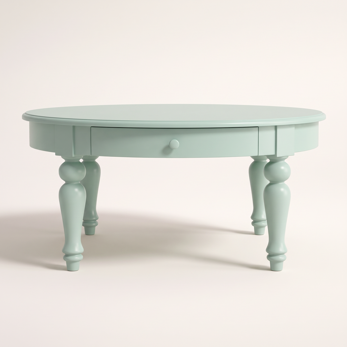 Eden Round coffee table in mint green PU finish with drawer and knob, front elevation view