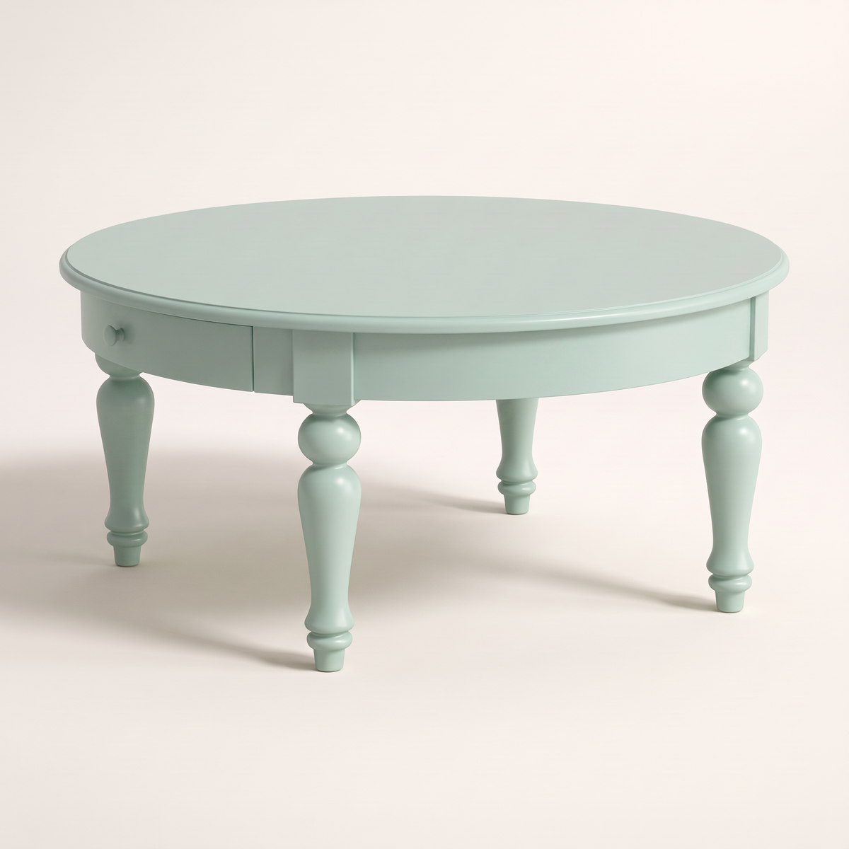 Eden Round coffee table in mint green PU finish with turned legs, front-right view