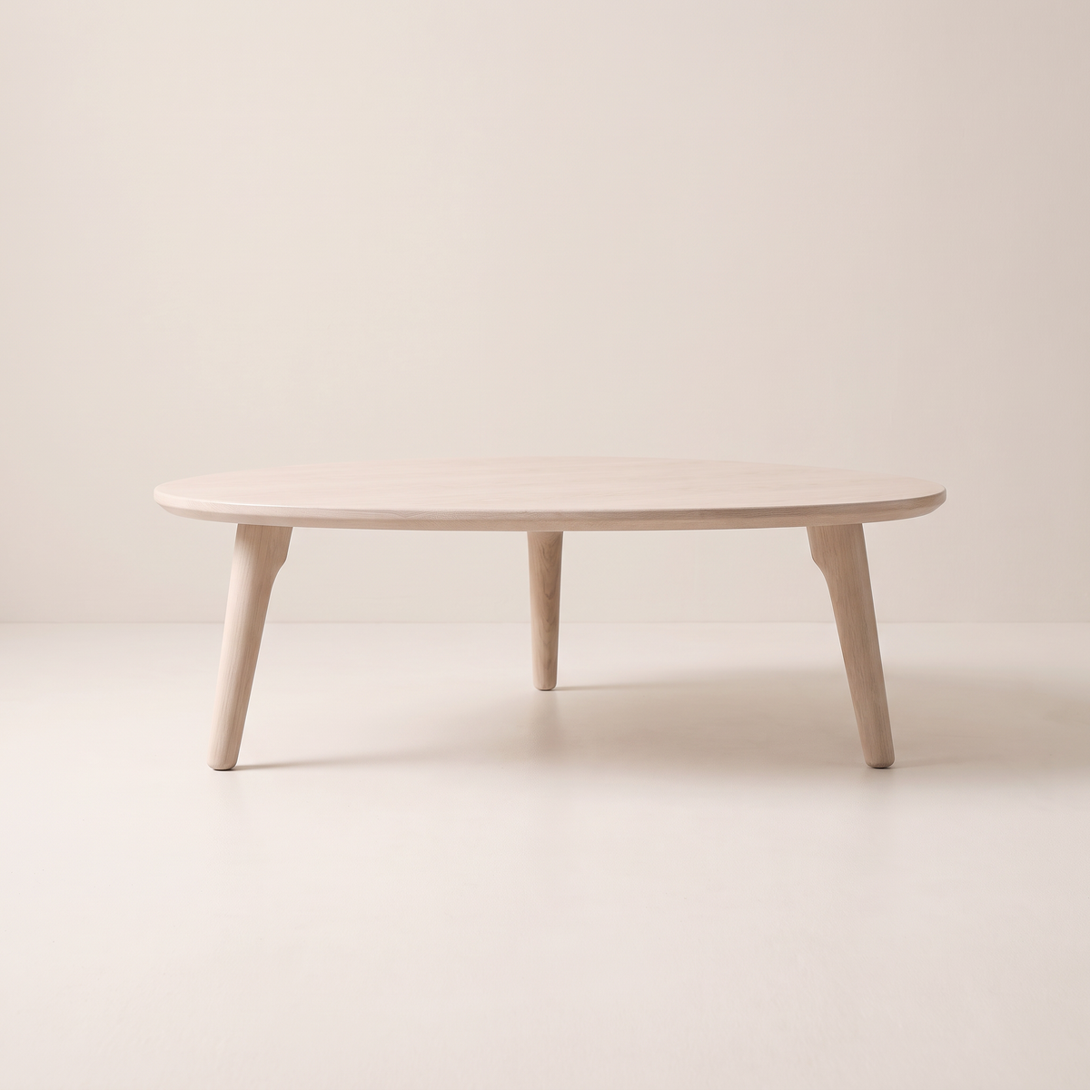 Eira Ash coffee table in pale whitewashed wood, front elevation view