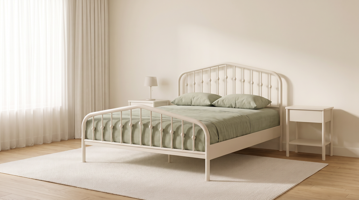 Elara off-white metal bed styled in a calm bedroom