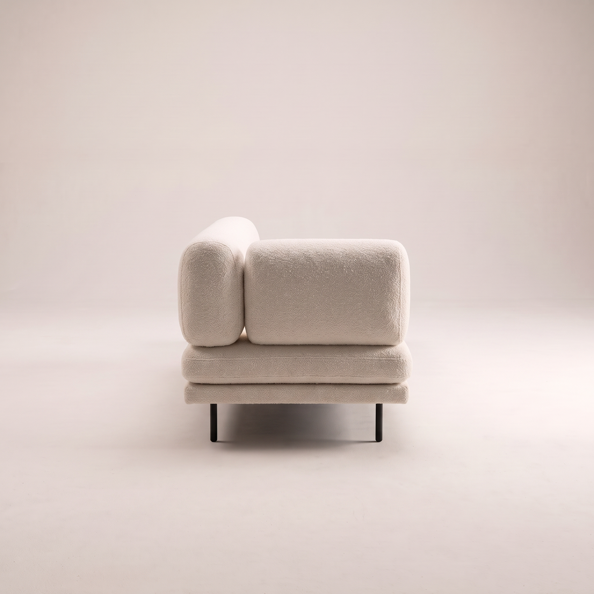 Eon Ivory low sofa in ivory boucle-style upholstery, side profile view