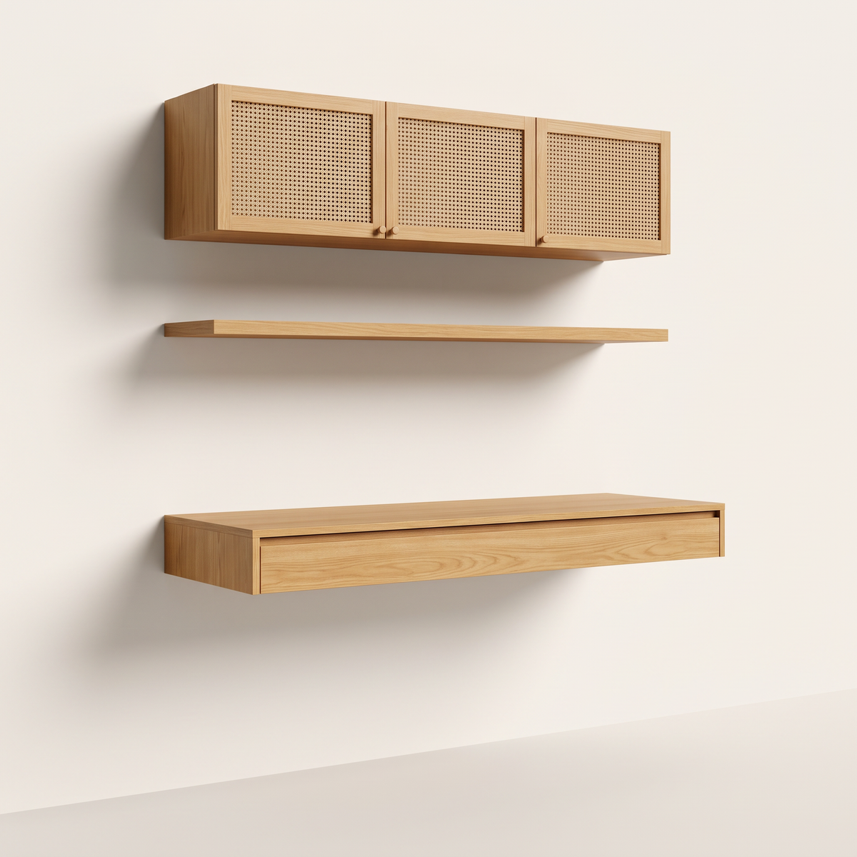 Floating Cane Study wall-hung honey ash desk with drawer, floating shelf and ash wall cabinets with natural cane doors, front three-quarter view