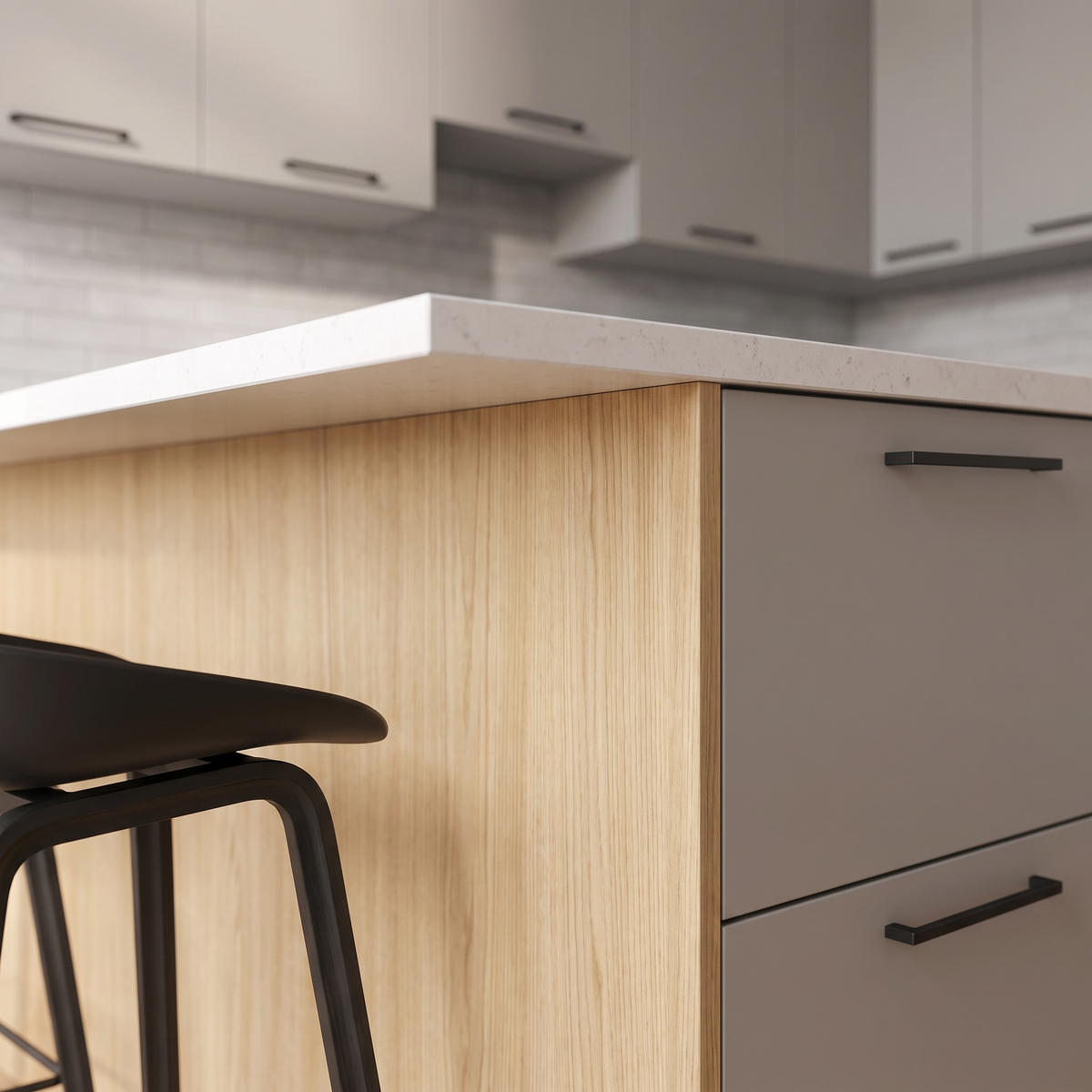 Fog Peninsula detail of the ash veneer peninsula corner, white quartz edge and fog-grey drawers with black pulls