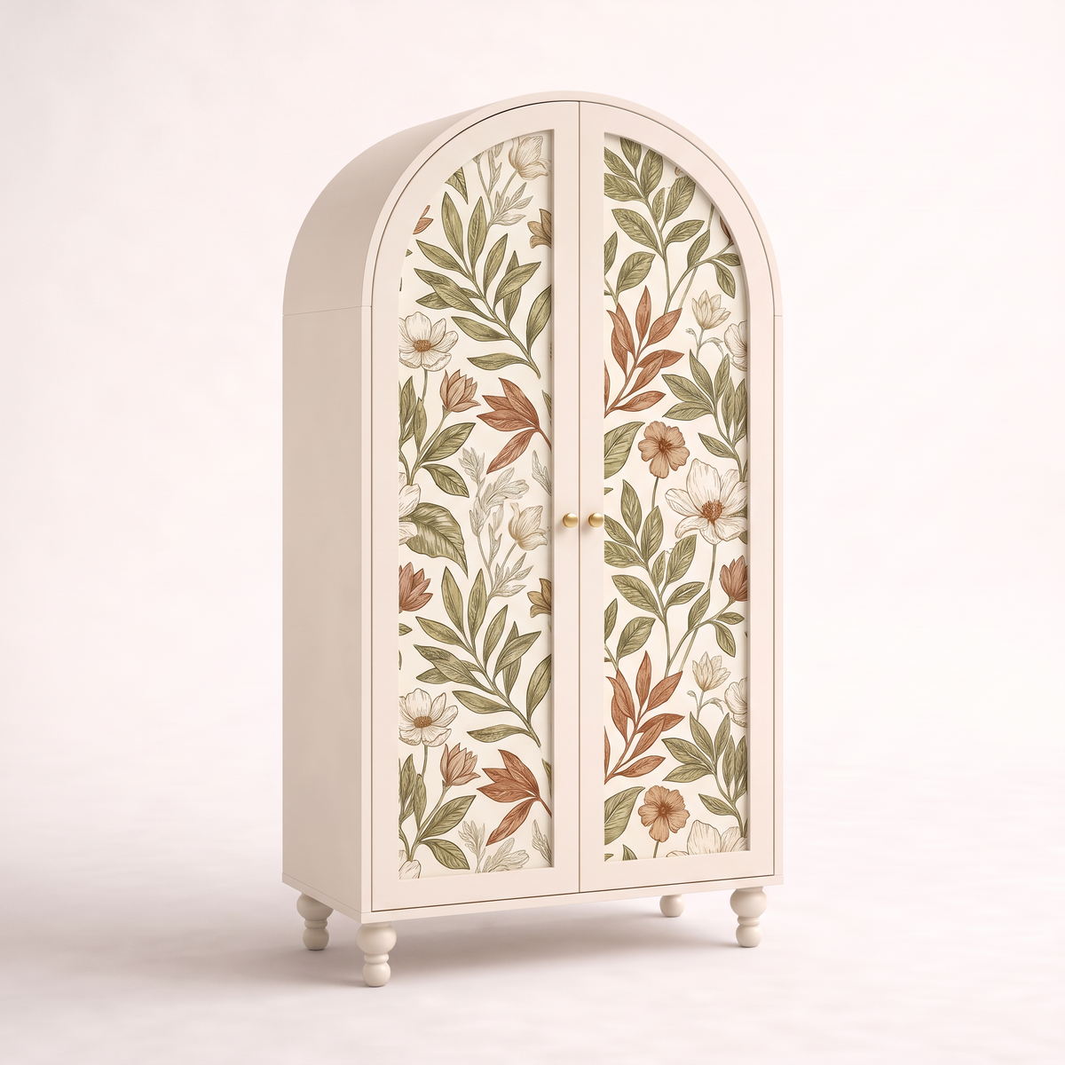 Folio Arch Wardrobe in ivory lacquer with arched top, botanical wallpaper door panels and turned legs, front three-quarter view