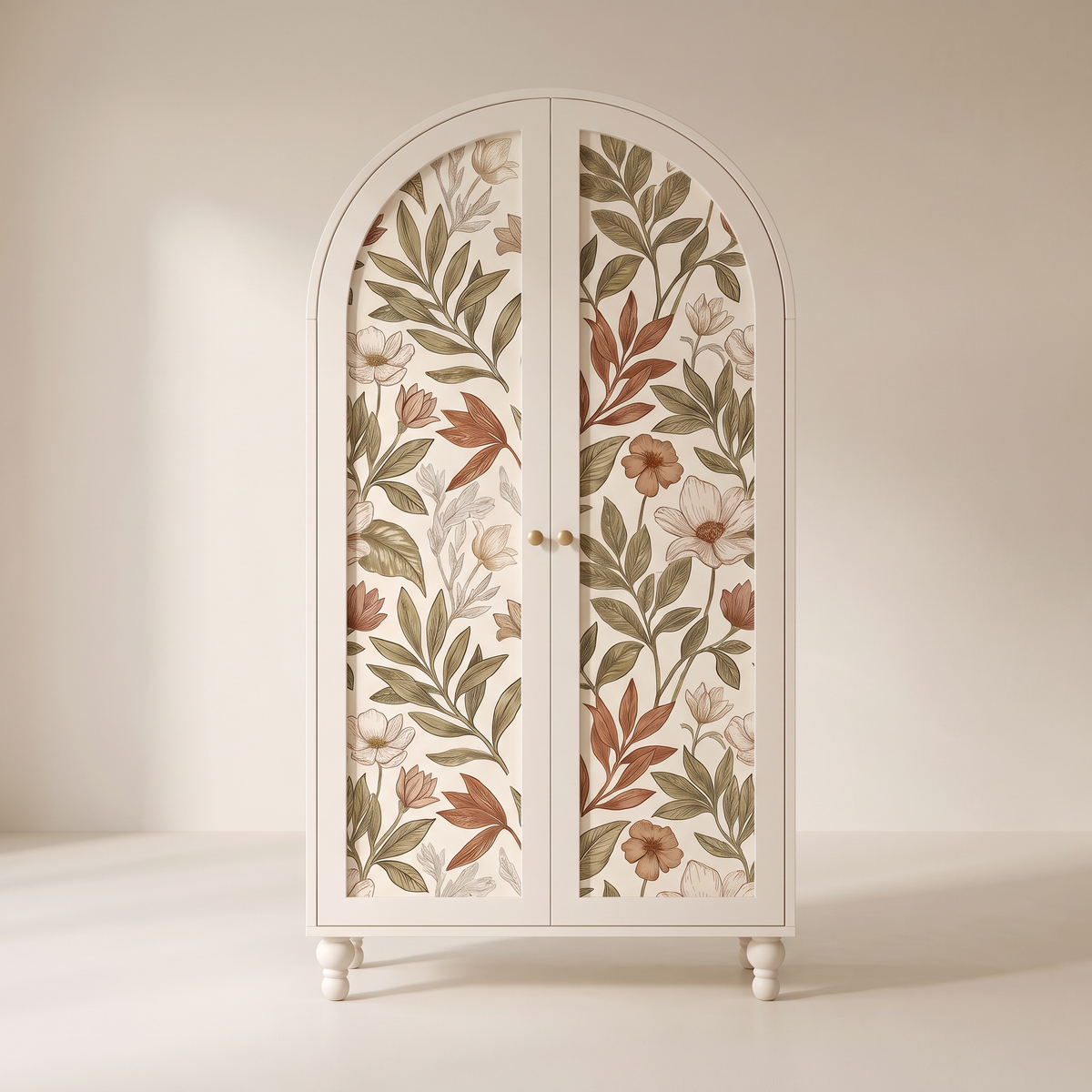 Folio Arch Wardrobe with arched botanical wallpaper doors and brass knobs, straight front view