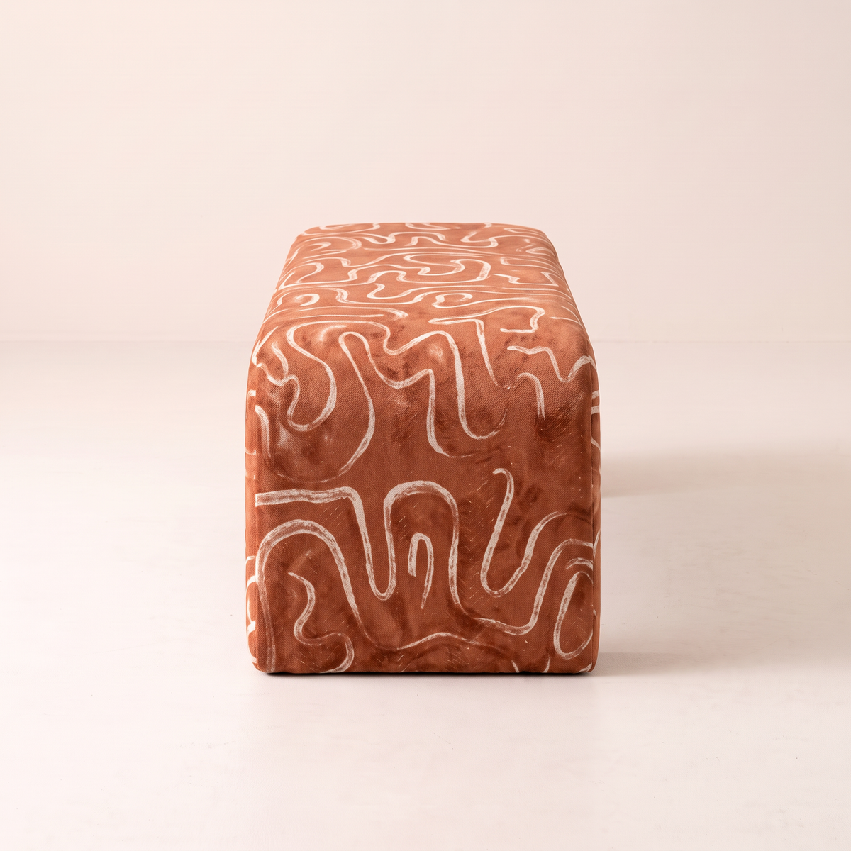 Glyph – Line bench, end view showing the rounded slab end and squiggle print