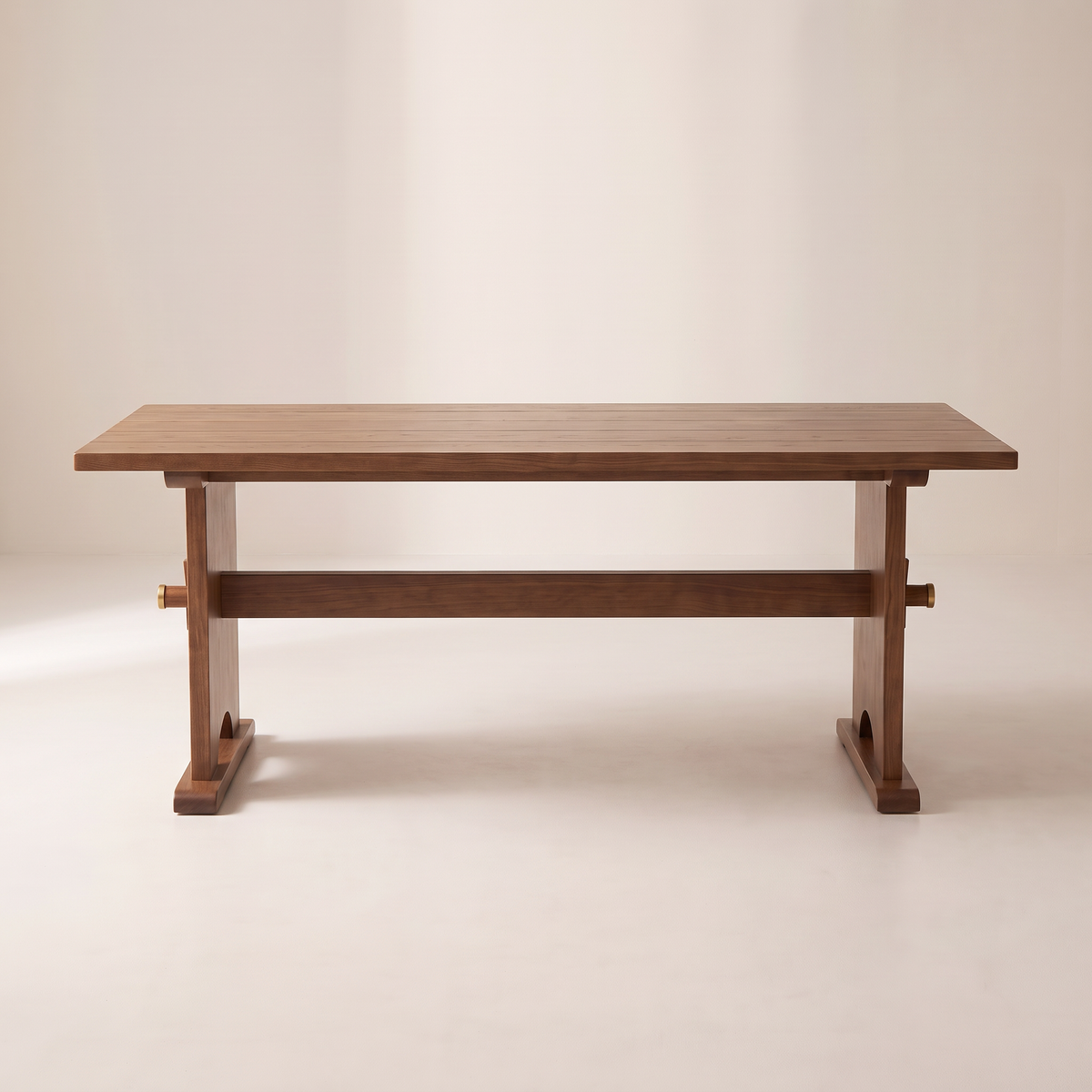Haveli Trestle solid ash dining table with central stretcher, straight front elevation