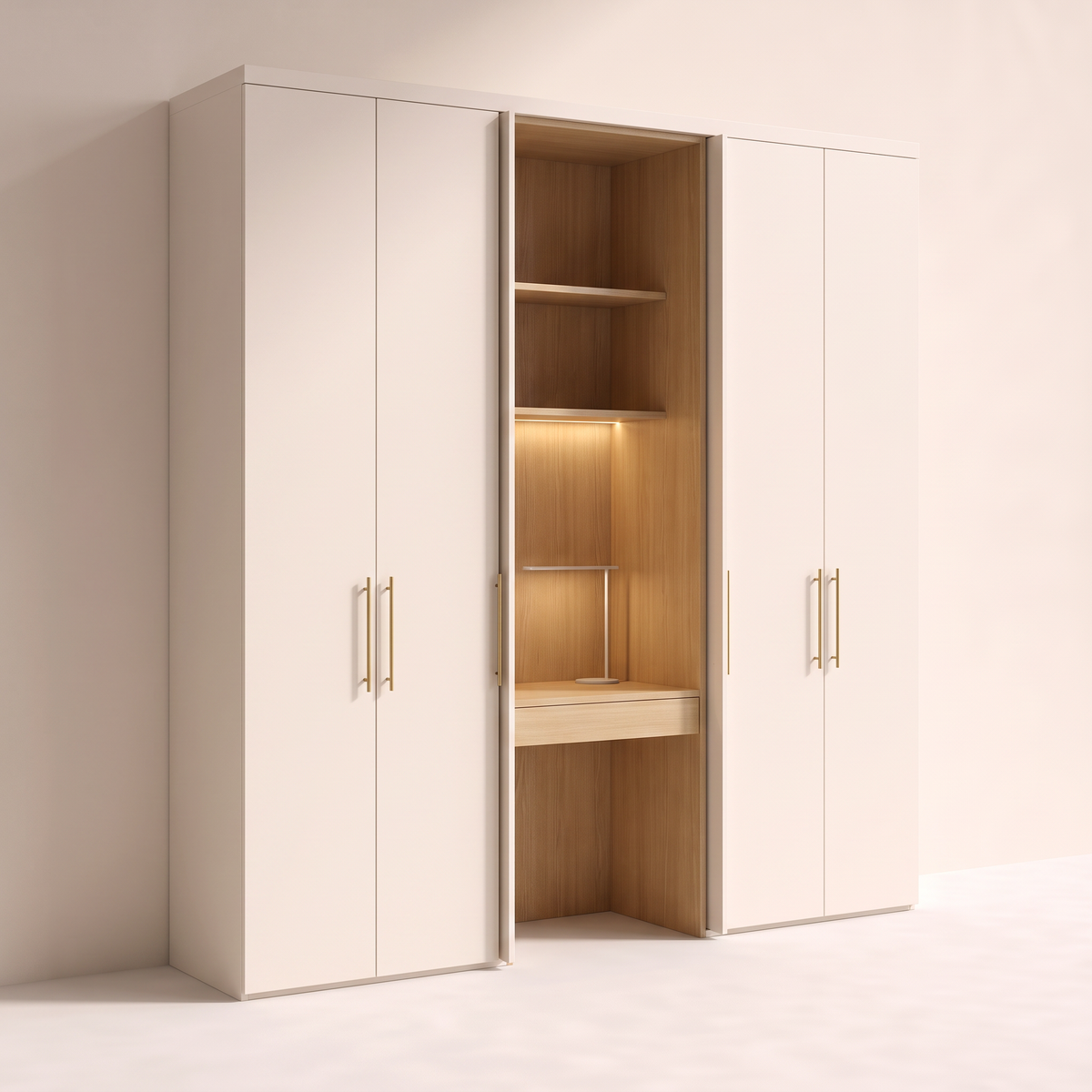 Hidden Desk Wardrobe ivory laminate wardrobe wall with brass bar pulls and a central lit study nook lined in honey ash, pocket doors slid back, front three-quarter view