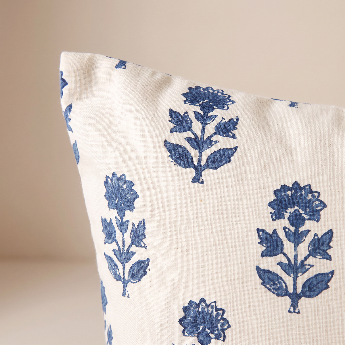 Close-up of Indigo Buti Cushion showing hand block-printed indigo floral sprigs on cotton