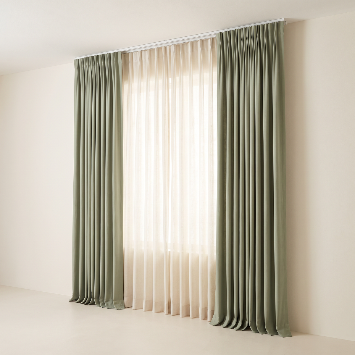 Layer Pair Set with sage cotton blackout curtains and ivory linen-blend sheers on a double ceiling track, front three-quarter view
