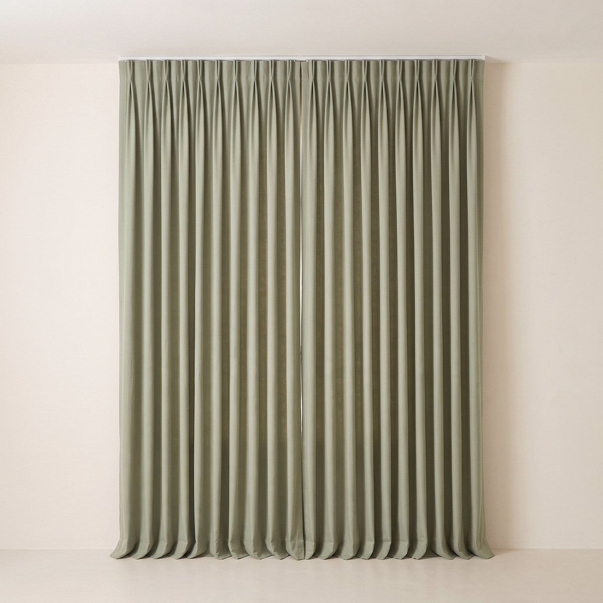 Layer Pair Set sage blackout curtains fully drawn in pinch pleats, straight front view