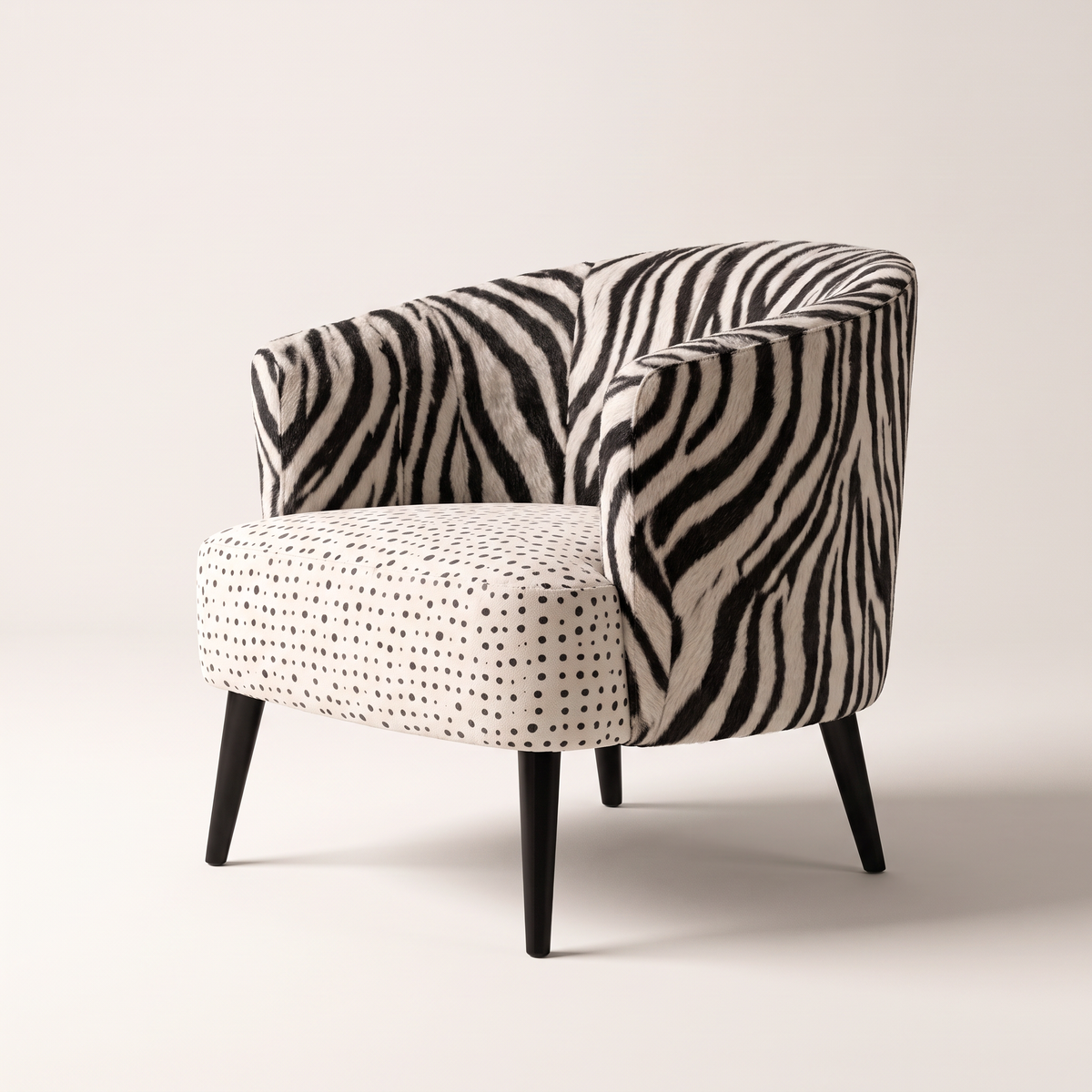 Mono Dot lounge chair in zebra-print shell with polka-dot seat and black tapered legs, opposite three-quarter view