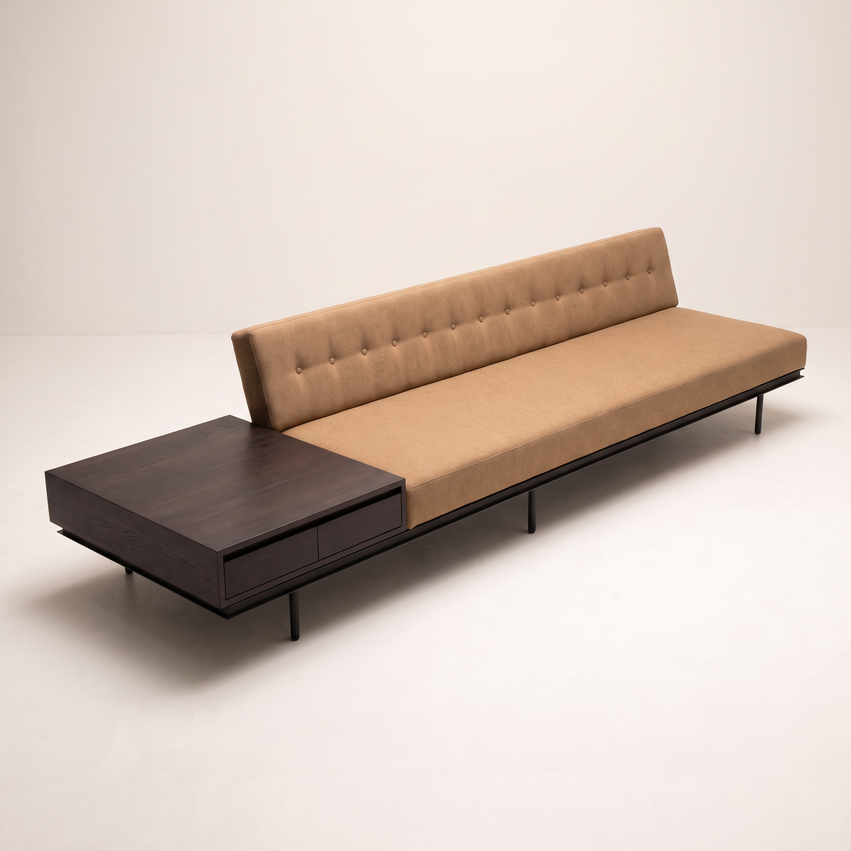 Monolith Brown sofa in camel-tan upholstery with integrated dark wood table, elevated three-quarter view