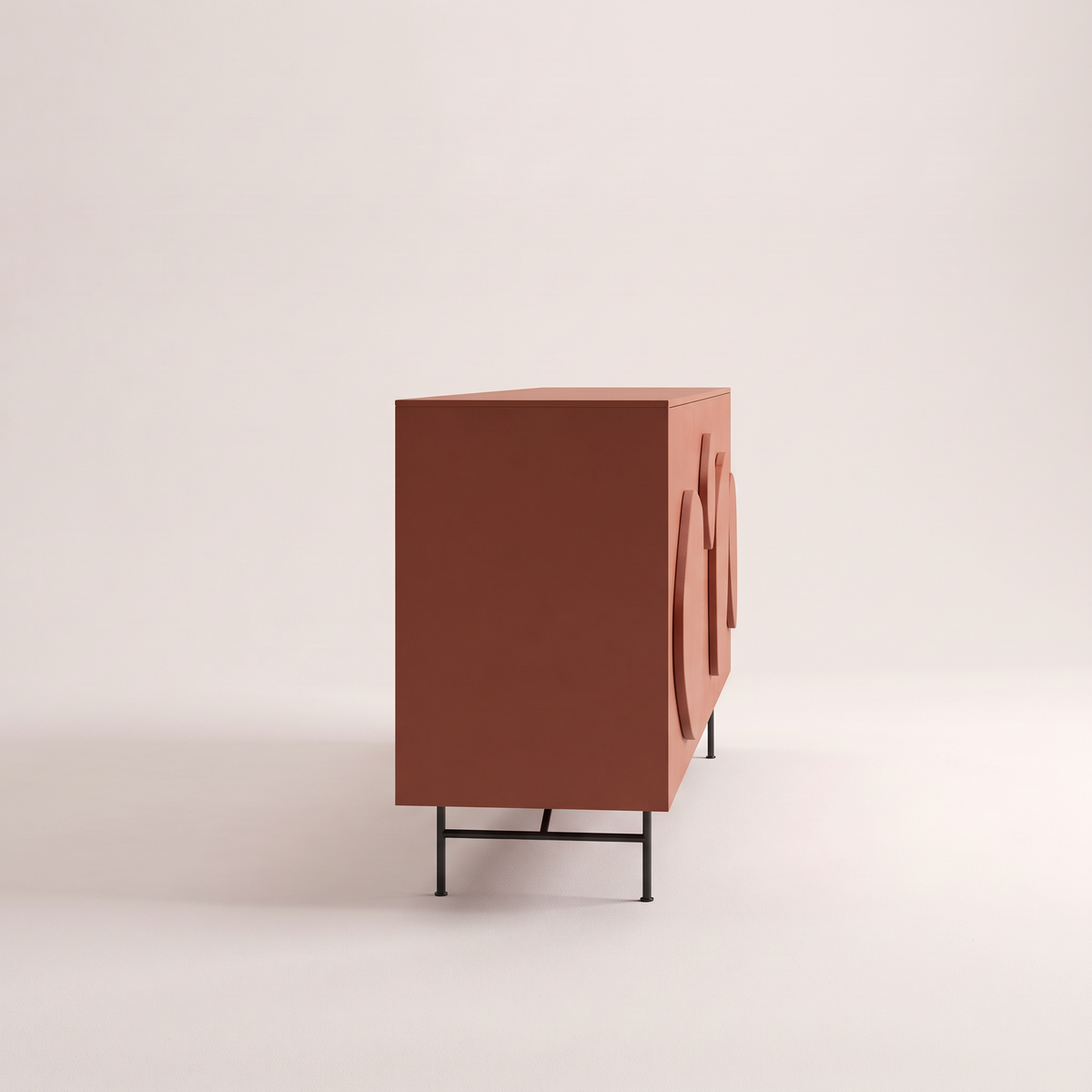 Mora Red storage cabinet in matte terracotta red with black metal legs, side profile view