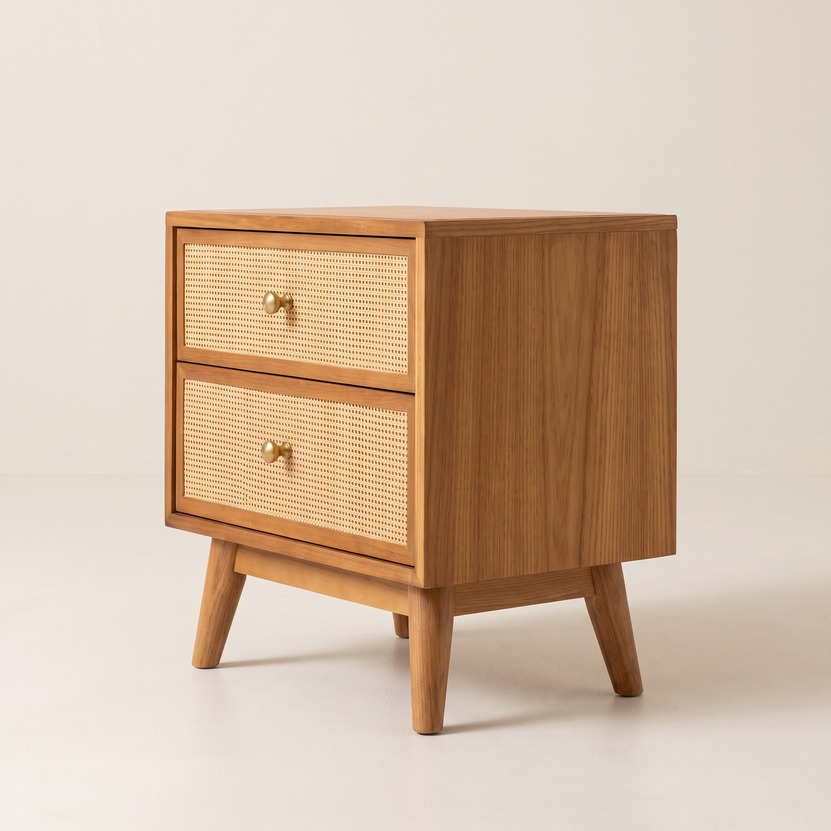Night Stand 813 bedside table in honey ash with cane drawers, front right three-quarter view