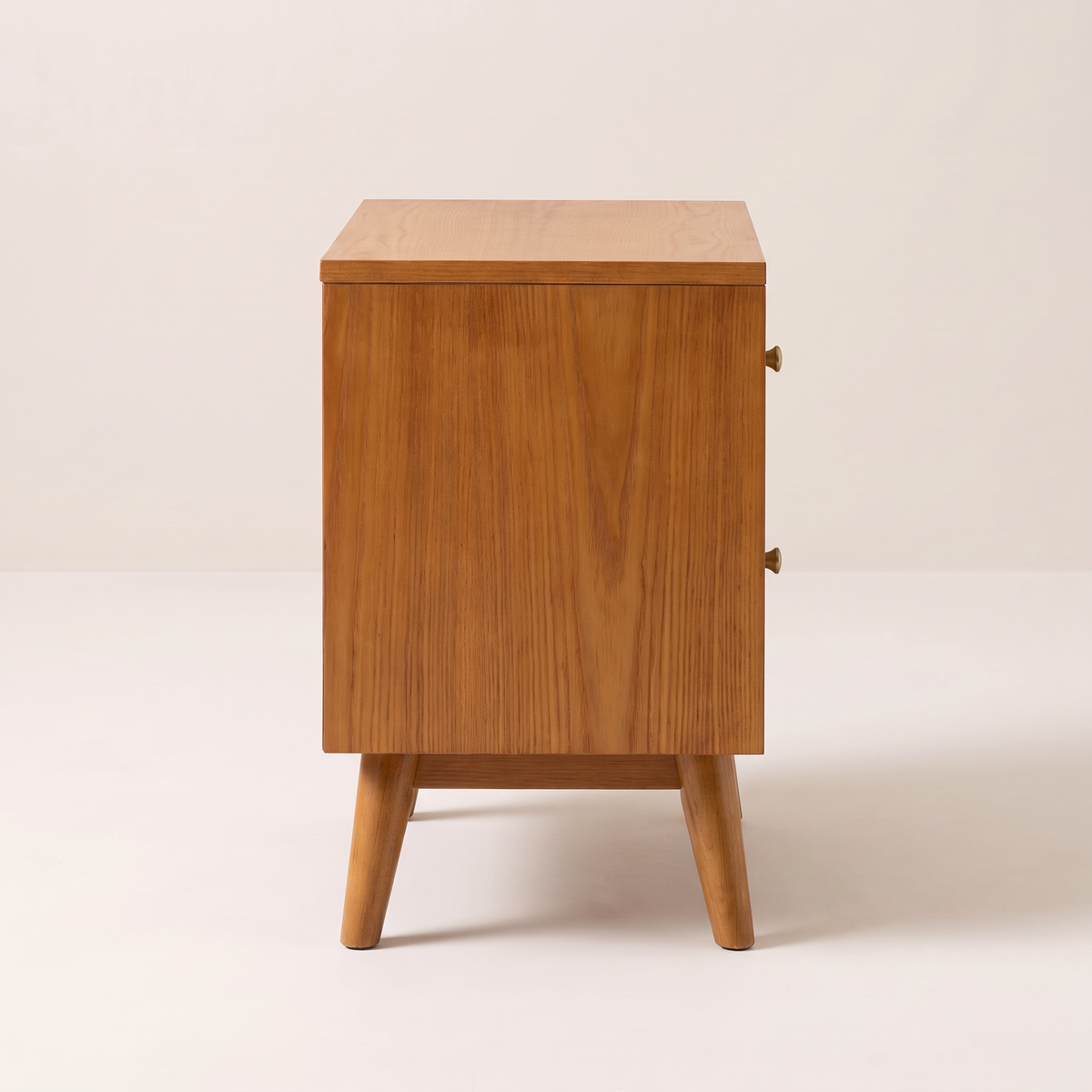 Night Stand 813 bedside table in honey ash with splayed legs, side profile view