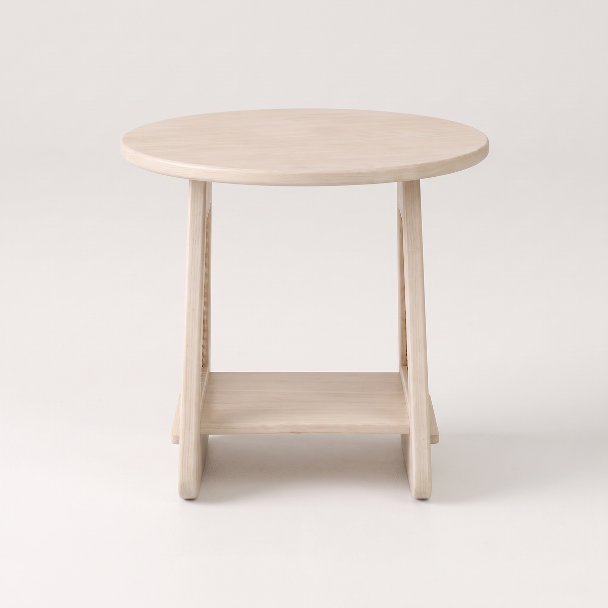 Night Stand 817 round bedside table in pale ash with low shelf, front view