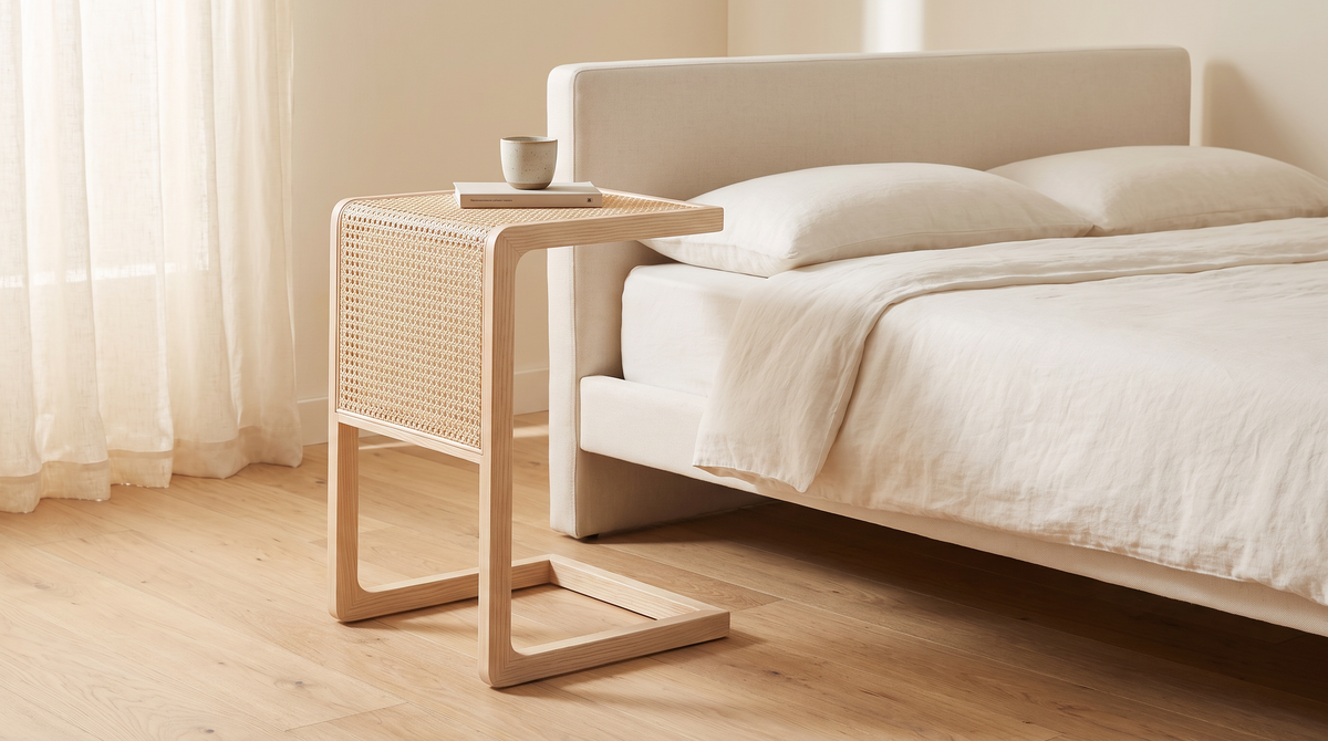 Night Stand 818 C-shaped bedside table styled beside a bed in a calm bedroom