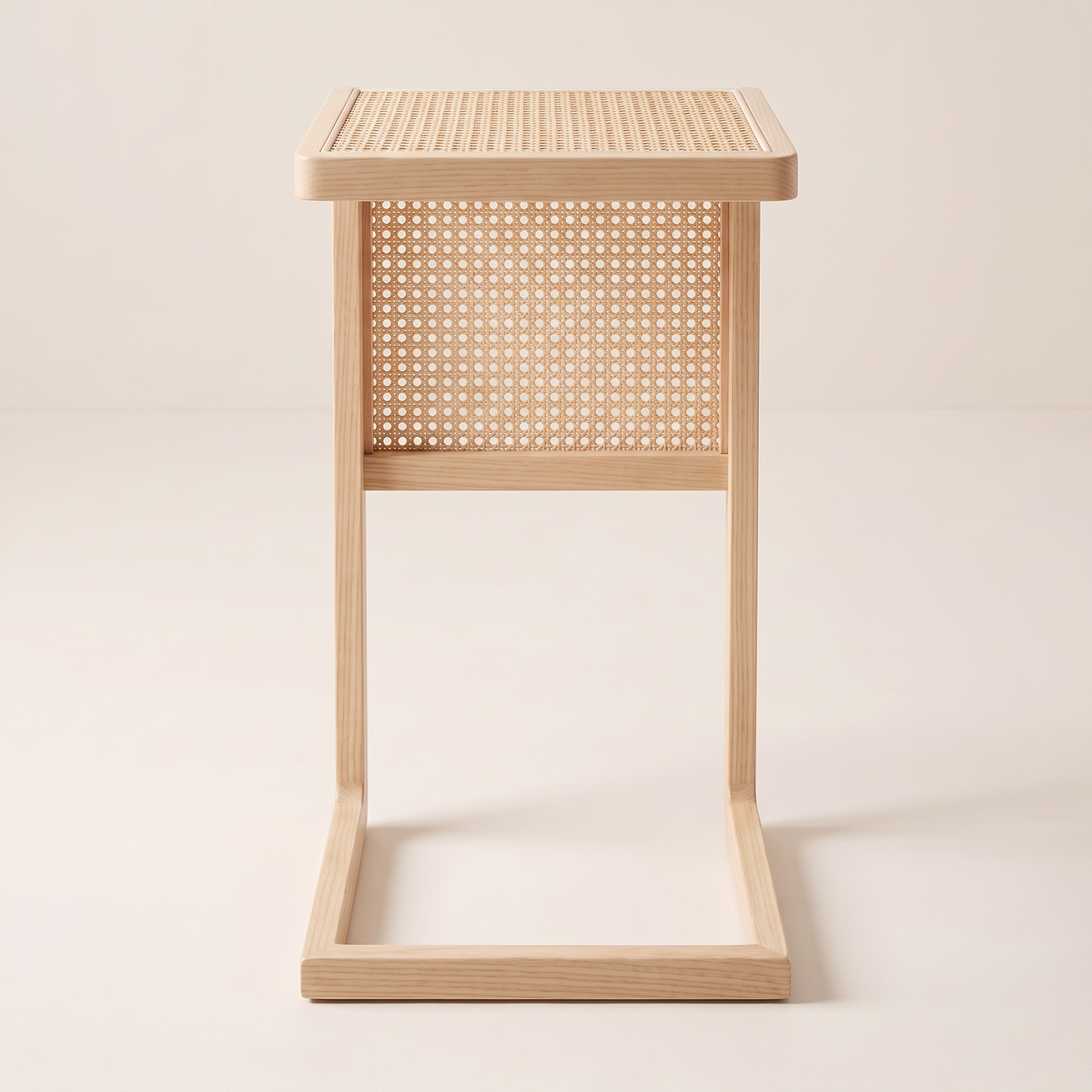 Night Stand 818 C-shaped bedside table in pale ash and cane, front view