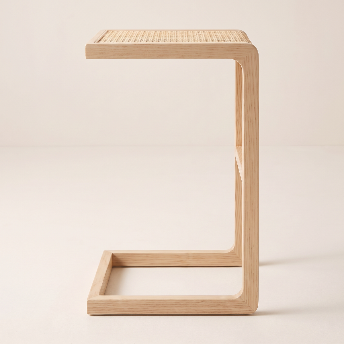 Night Stand 818 C-shaped bedside table in pale ash, side profile view