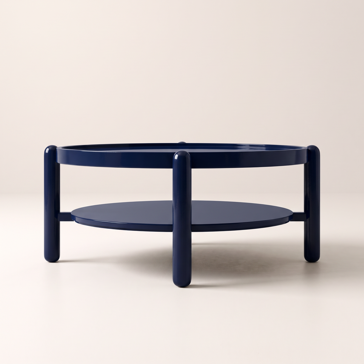 Noir Blue round coffee table in glossy navy with lower shelf, front elevation view