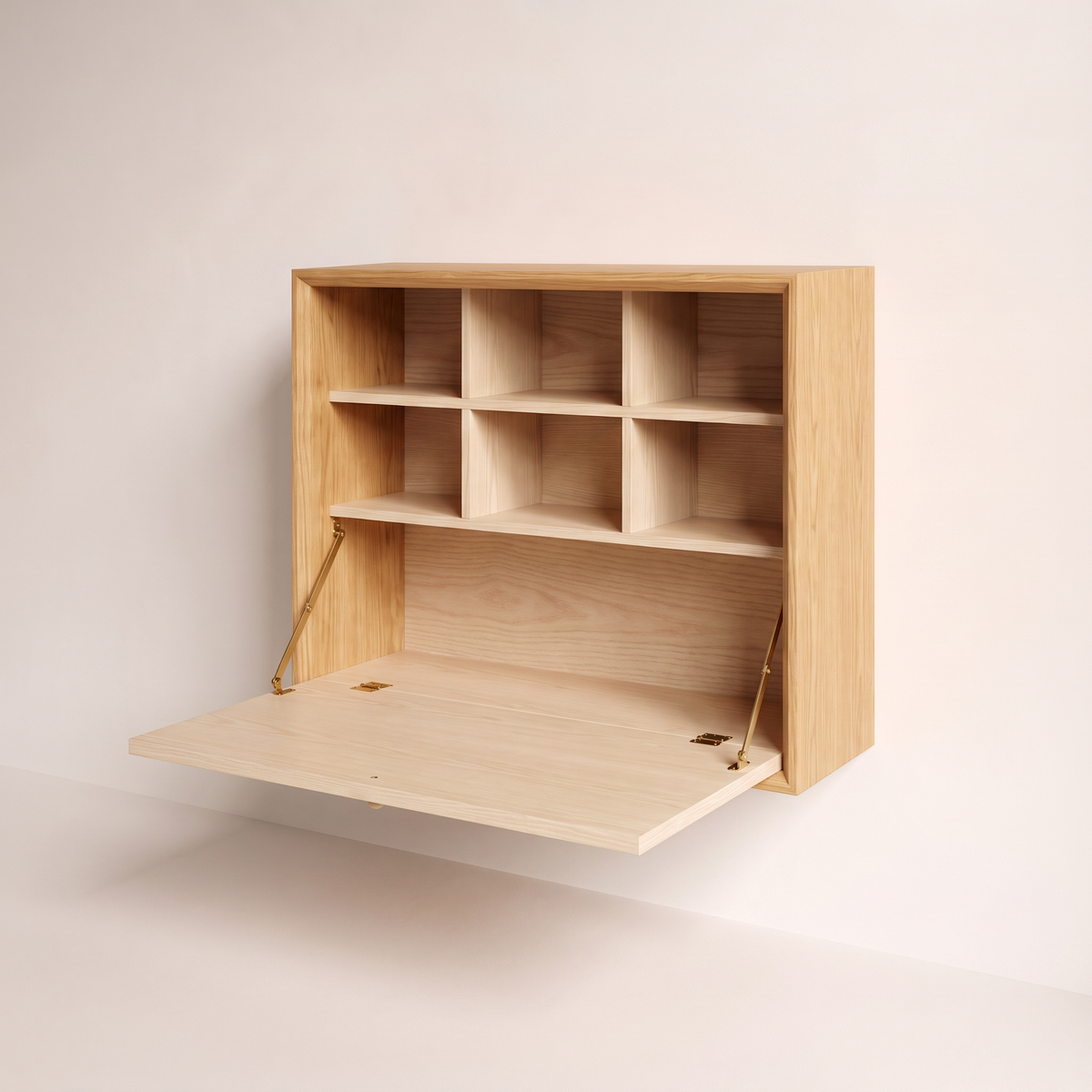Nook Fold Desk open in honey ash with pigeonhole cubbies, front-right three-quarter view
