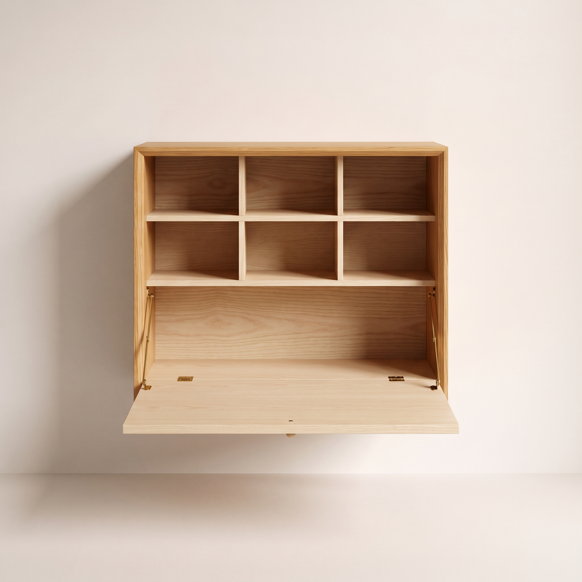Nook Fold Desk open, ash writing surface lowered on brass stays revealing six pigeonhole cubbies, front view