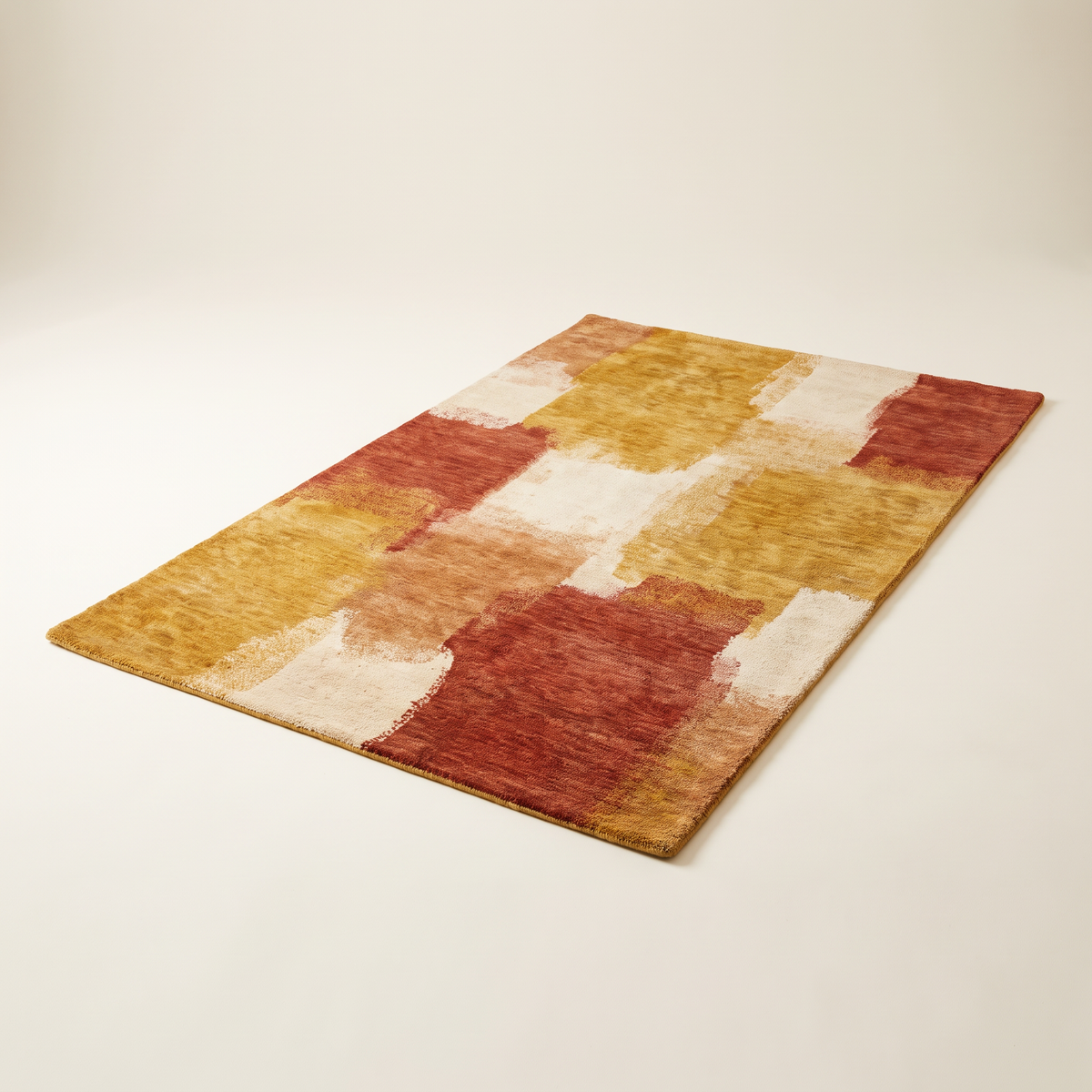 Ochre Field Rug, hand-knotted wool with abstract ochre, rust and cream blocks, elevated three-quarter view