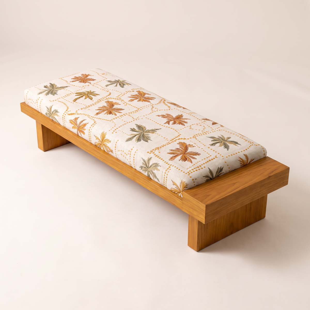 Palmira 1 bench, elevated three-quarter view showing the palm-print cushion top