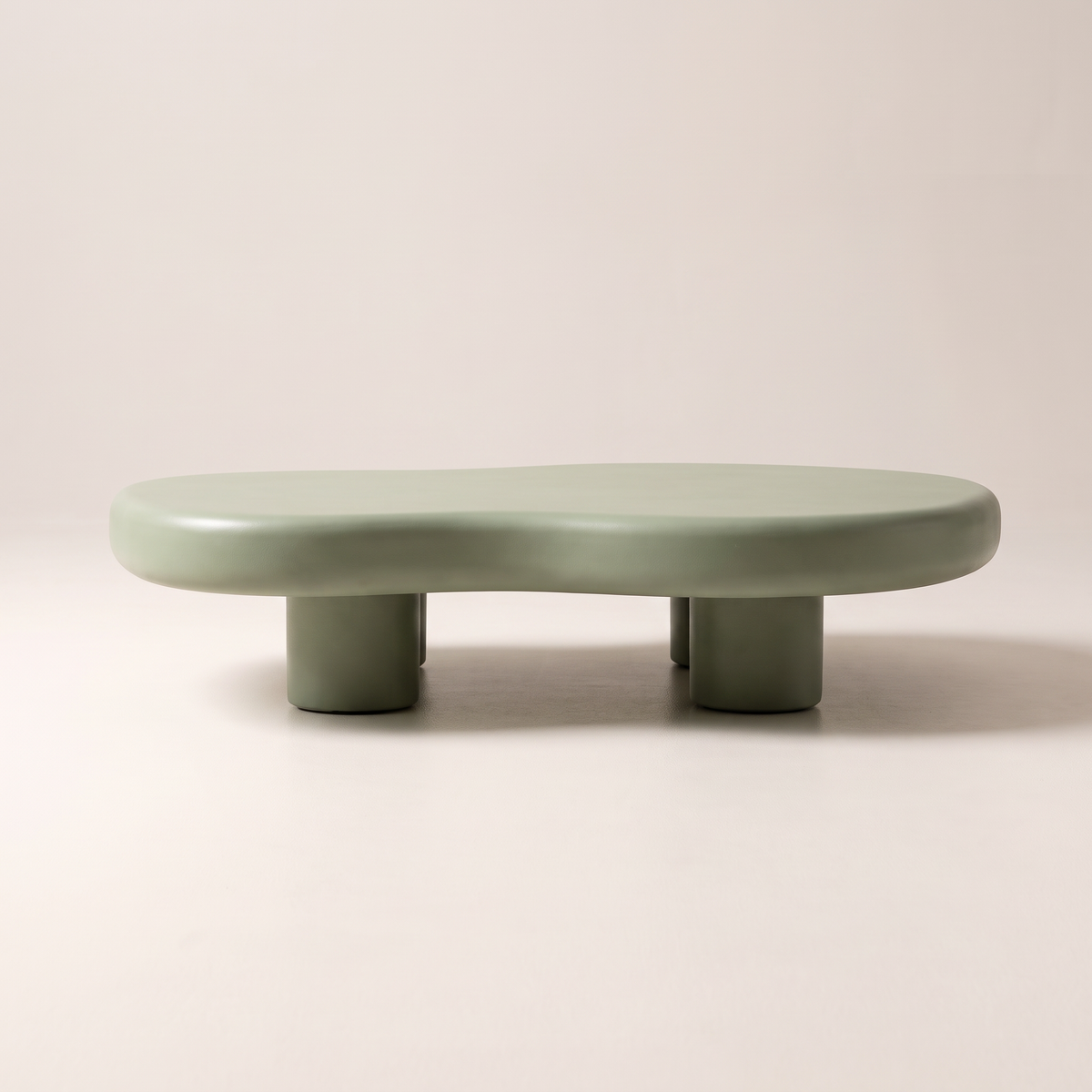 Pebble Sage coffee table in matte sage green with stub legs, front elevation view