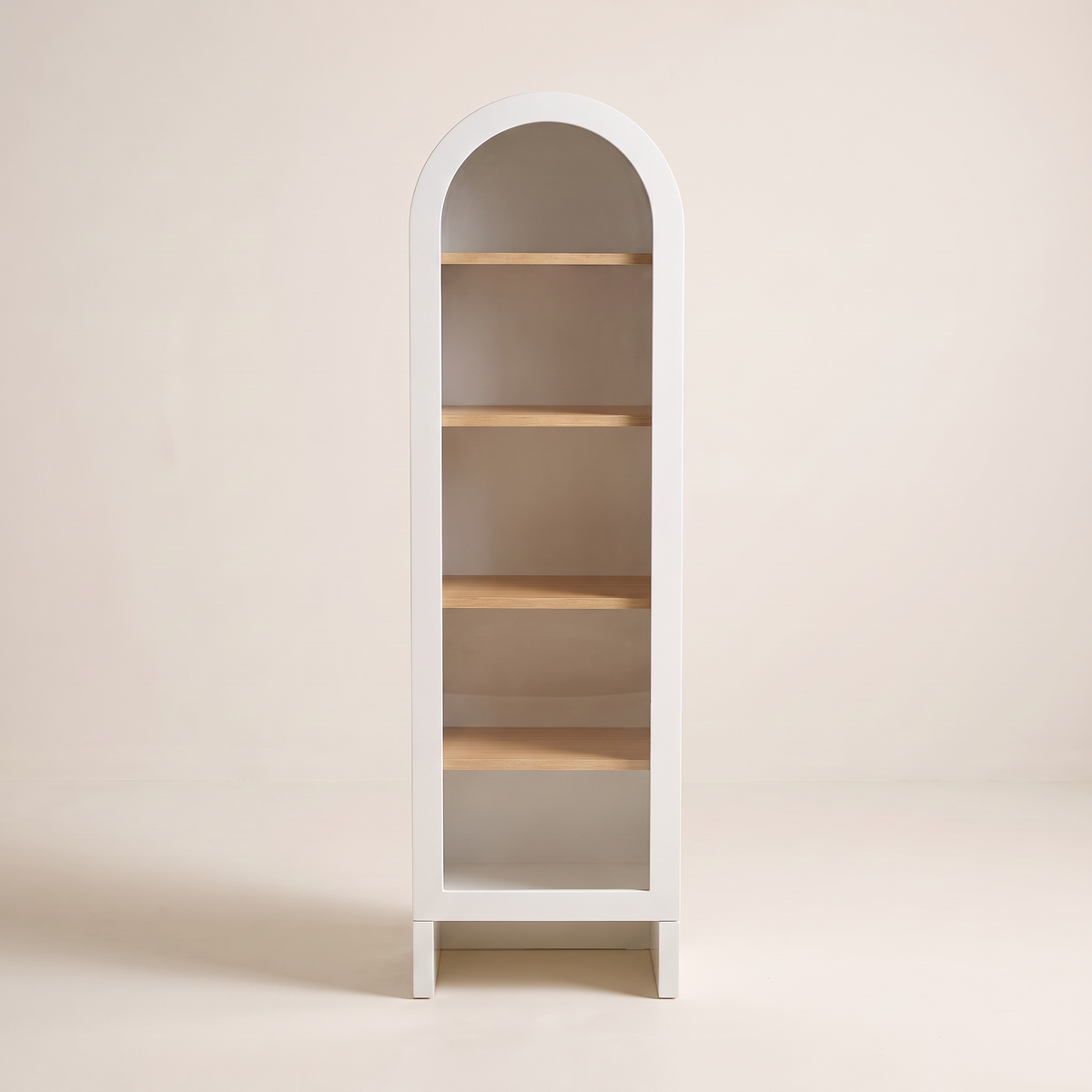 Portal Bookcase in matte white with arched top, clear glass door and light wood shelves, front view
